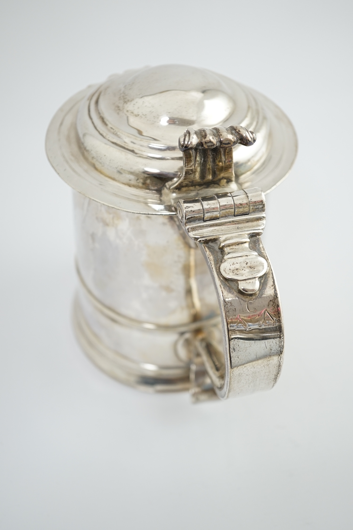 A late Queen Anne Britannia standard silver tankard, maker R?